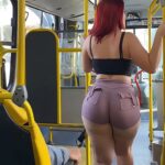 Red-haired Brazilian Electra with a big ass gets horny on a public bus and gives blowjobs to a passenger.